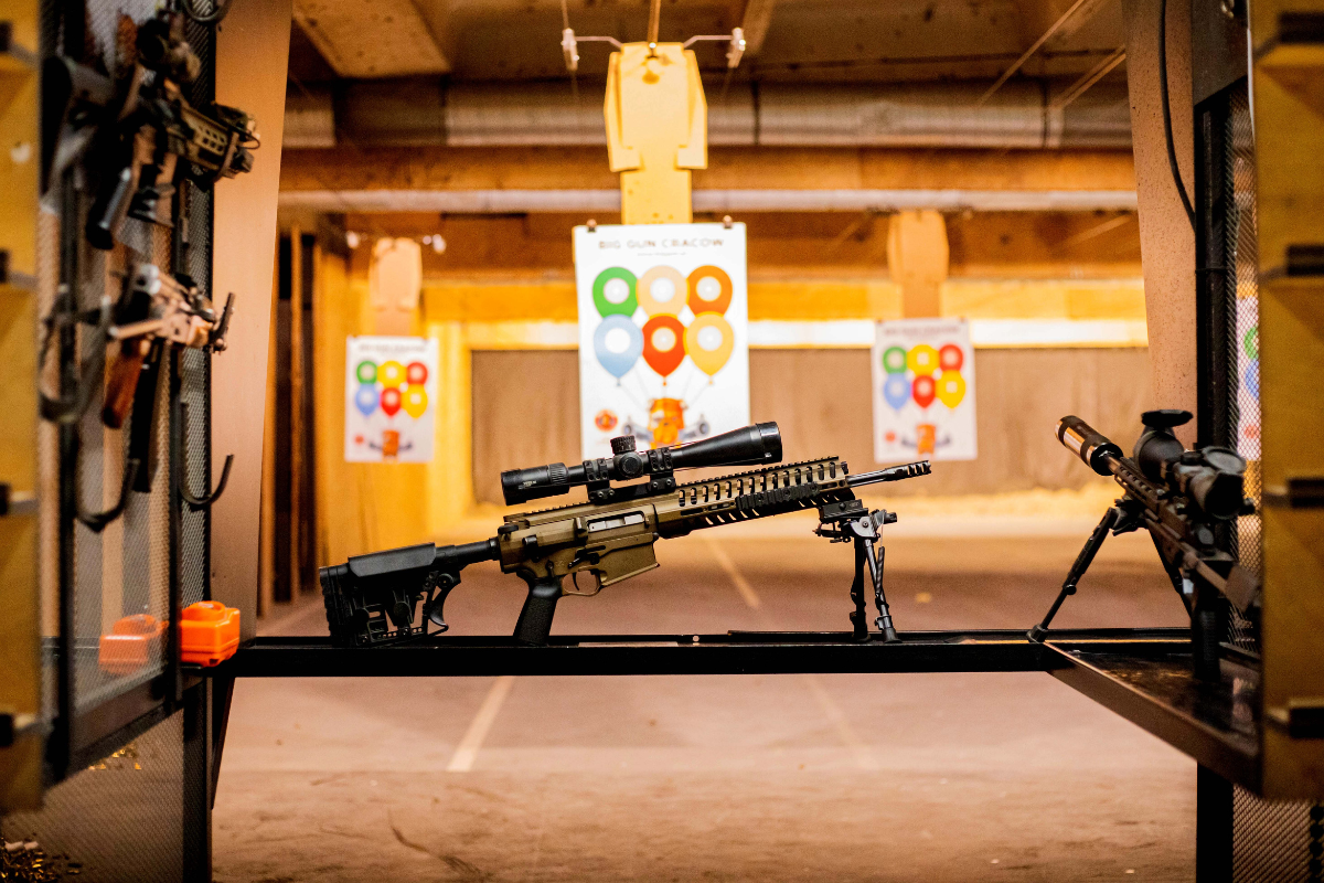Precision sniper rifle positioned on the shooting lane at Krakow shooting range, ready for target practice.